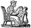 Image of woman in chair and two children